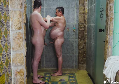 Old Man Taking a Shower with Boy