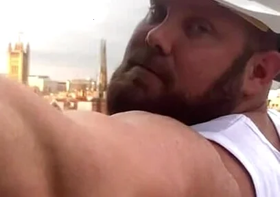 Builder Iron Bending Muscle Flexing and Measuring