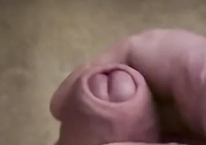 My Friend Sits in a Chair and Jerks off His Cock While Watching Video