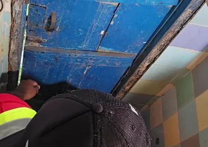Two Construction Workers Making Out in the Company Bathroom.