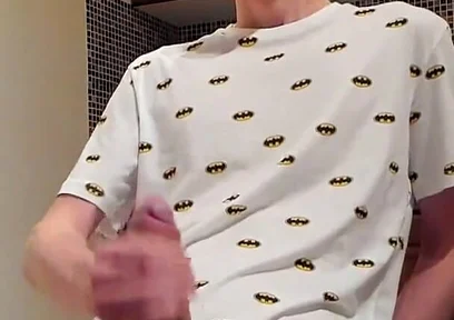 Sweet load of cum flows from this cute guy's big cock