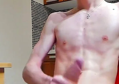 A young beautiful gay twink fucks a vibrator