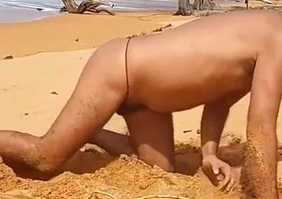 Ladysilva on the Beach Showing off His Hot Ass in Red Panties