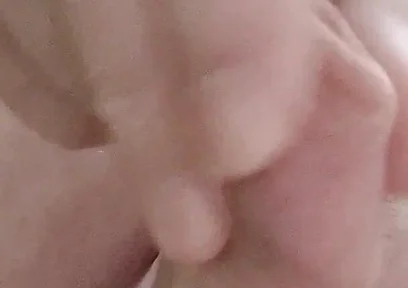 My Friend Sits in a Chair and Plays with His Little Cock and Watches Videos He Likes to Watch Videos Means He Watches Videos