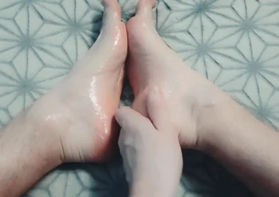 Guy Gently Massages His Feet with Oil