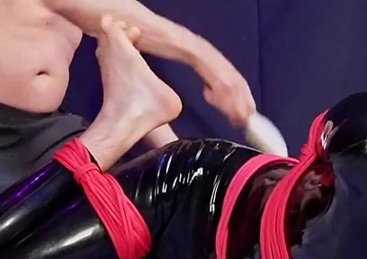 Nicky Roped Ballgagged and Tickled in Latex